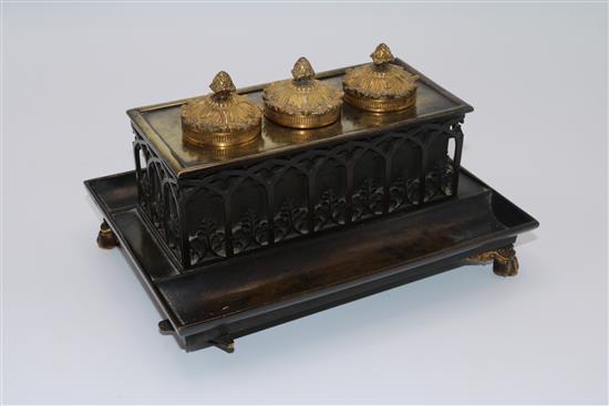 19C bronze sarcophagus-shaped three-well inkstand, with acanthus and gothic decoration on paw feet